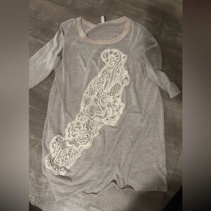 Beige with open lace free people long sleeve top. Size large worn once